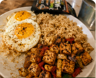Tofu, rice, eggs, and vegetables seasoned with Reggae Spice